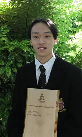 Daniel Tang with the Marinova Prize honour board