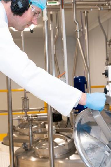 Marinova employee checking vats in the extraction room