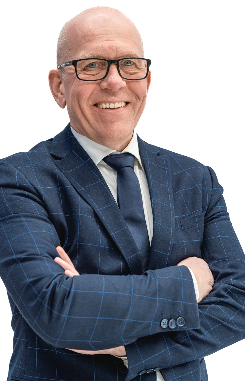 Mr Preben Soerensen, dressed in a suit at smiling at the camera