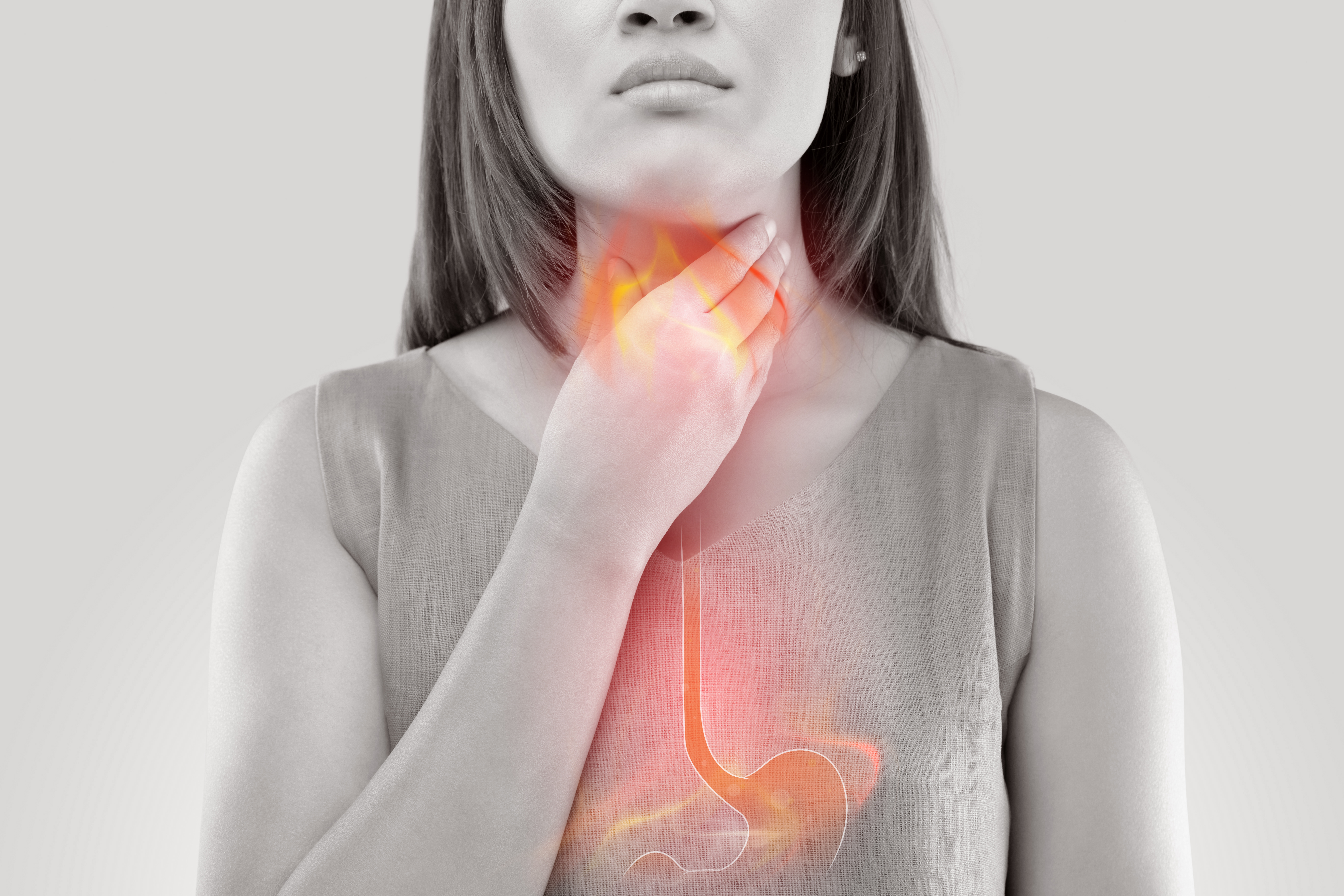 Woman Suffering From Acid Reflux 